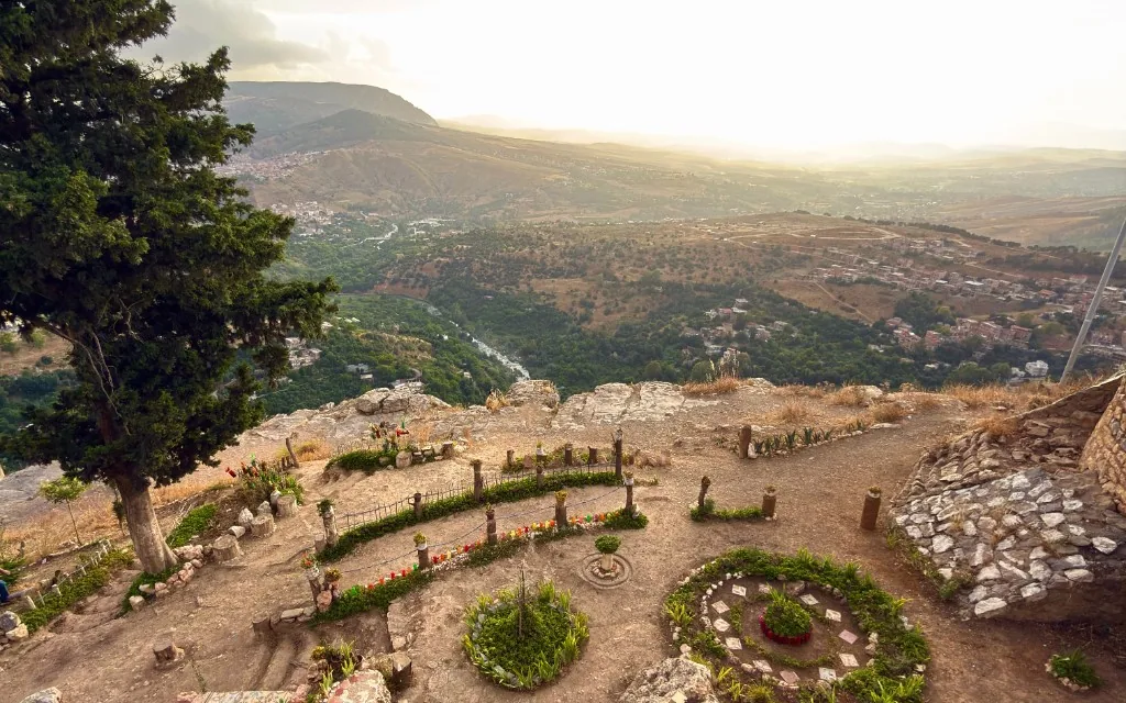 Valley and town seen from a rocky overlook